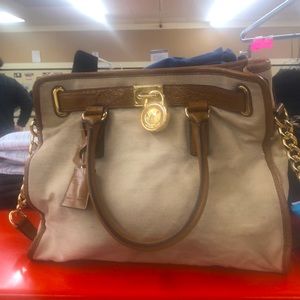 Michael Kors satchel with the strap